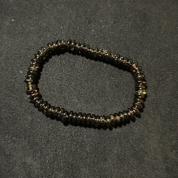 Kids gently used dark brown beaded 2.5 “ stretchy bracelet. - Picture 1 of 1